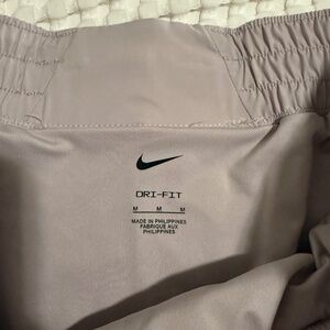 Nike Women's Mid-Rise 3in Dri-Fit athletic shorts